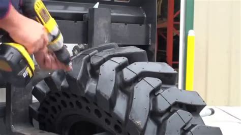 Studs in skidsteer tires 